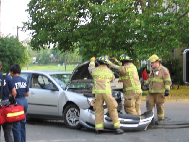 The Rescue crew secures a vehicle at a crash at Hodgson and S. Fourth Streets.